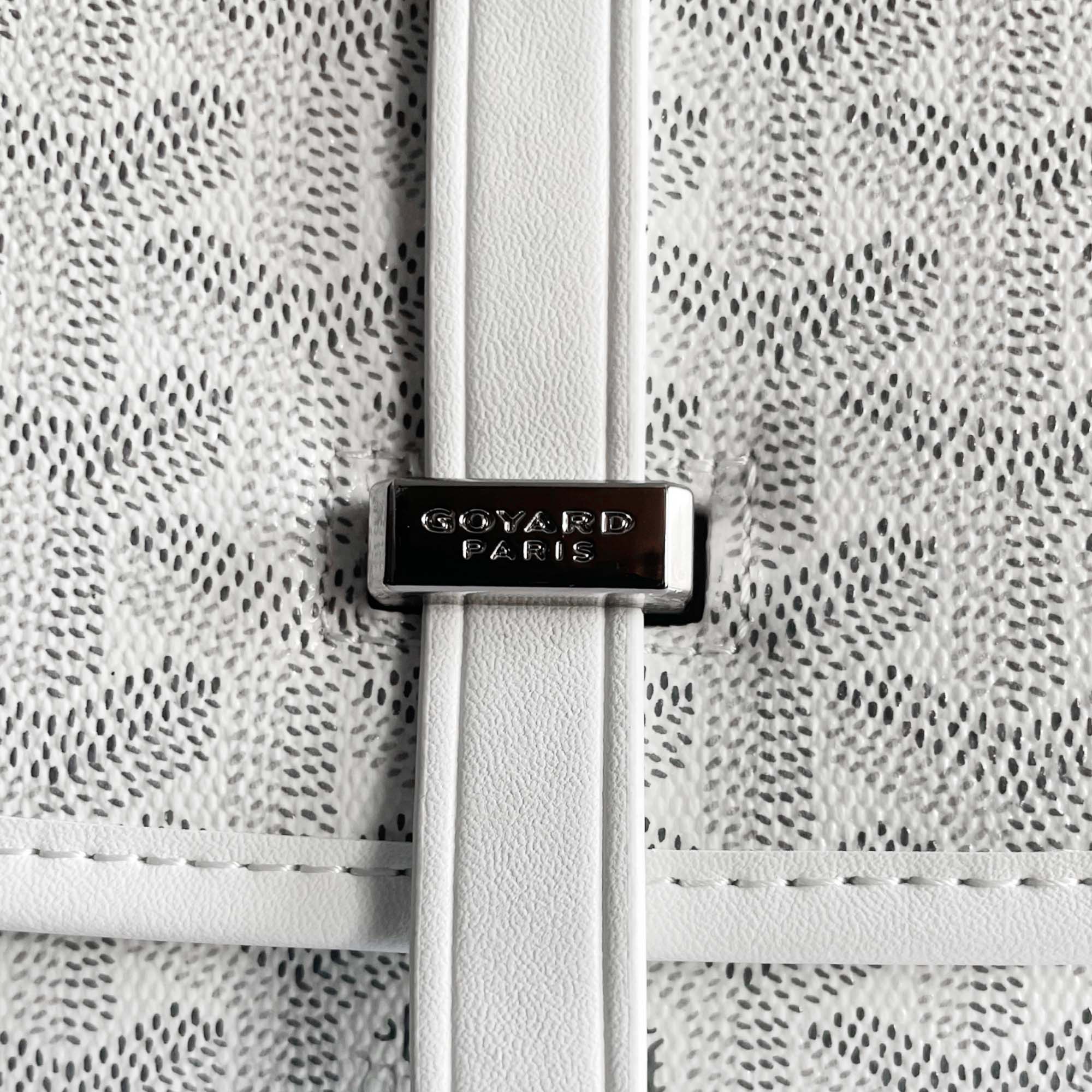 White Goyard bag by Central ae featuring a sleek design and signature pattern, perfect for stylish everyday use.