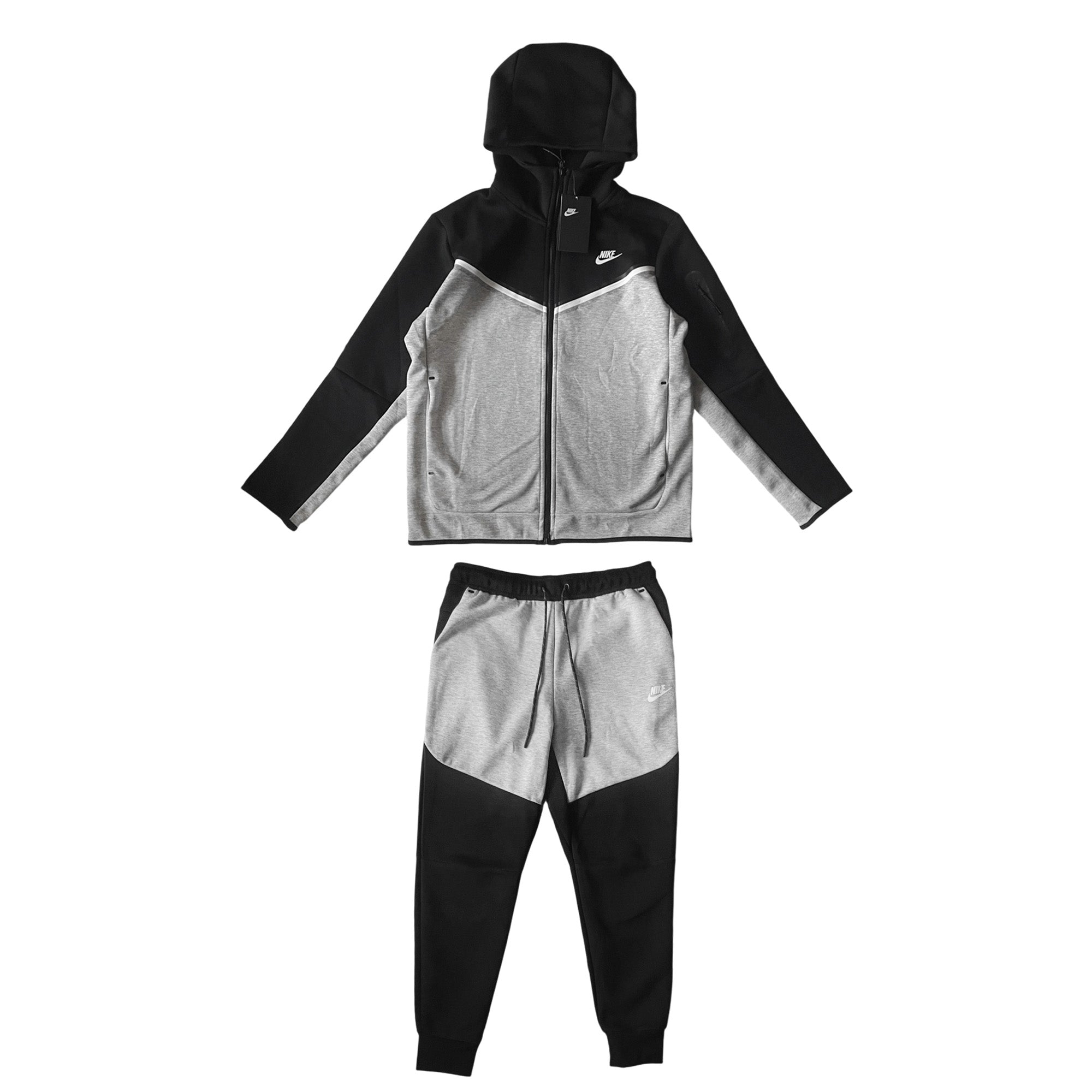 Nike Tech Fleece grey and black tracksuit featuring a hoodie and pants set displayed on a neutral background.