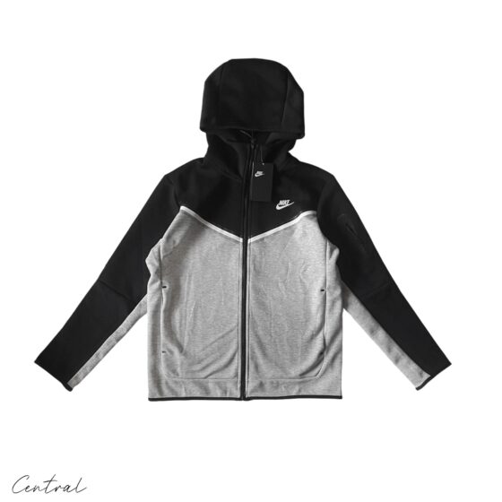 Nike Tech Fleece hoodie and pants set in grey and black, showcasing a modern athletic style and comfortable fit.