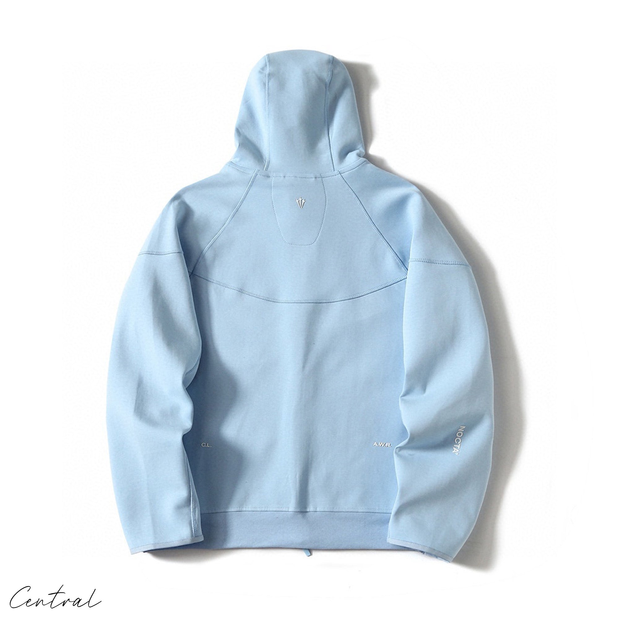 NOCTA Tech Fleece hoodie and pants set in black, featuring a modern design and comfortable fit by Central ae.