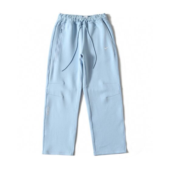 Central ae NOCTA Tech Fleece hoodie and pants set in a sleek design, showcasing soft fabric and modern style.