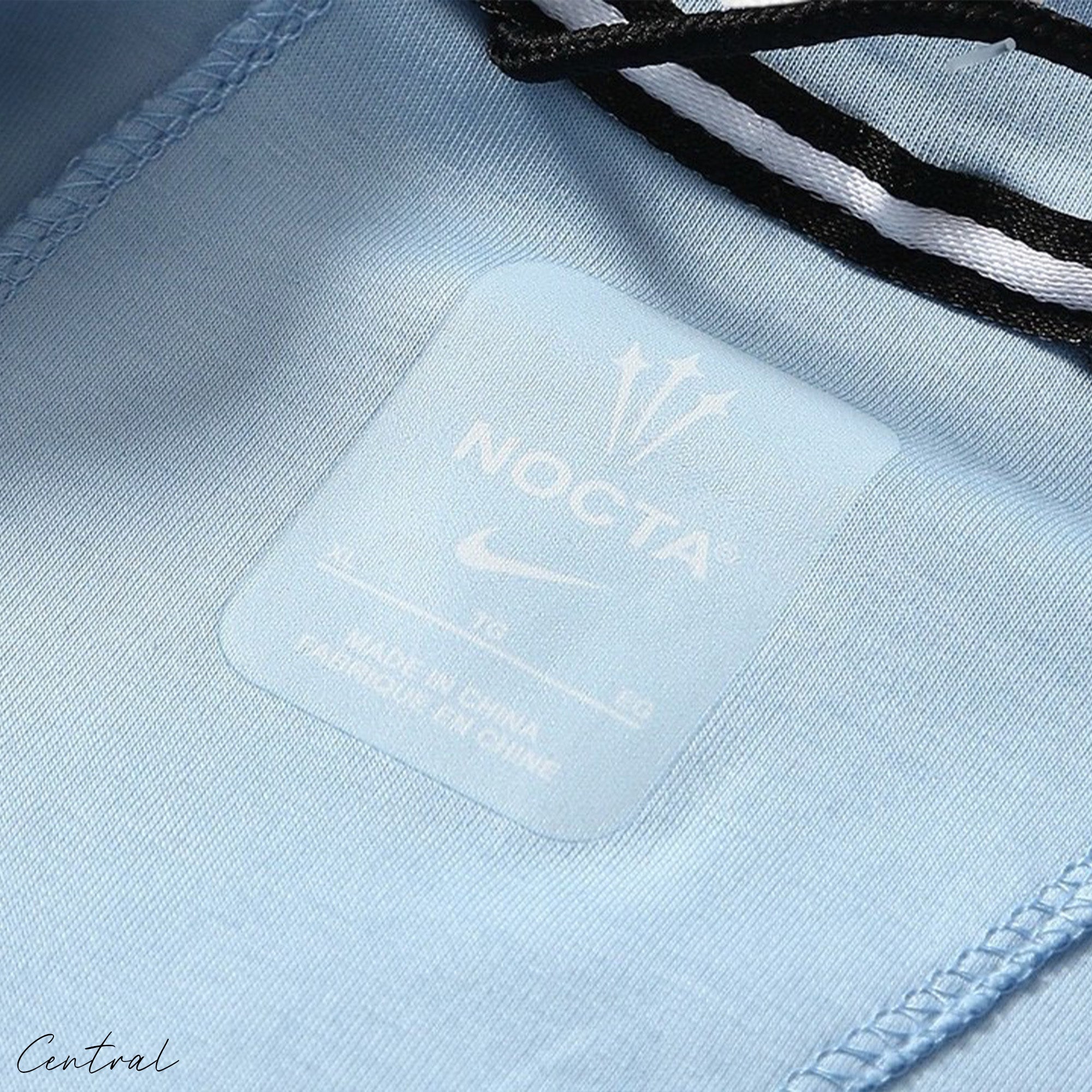 NOCTA Tech Fleece hoodie and pants set by Central ae, featuring a stylish design and comfortable fit in a casual setting.