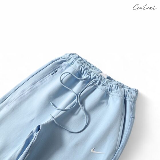 NOCTA Tech Fleece hoodie and pants set in black, featuring a modern design and soft fabric by Central ae.