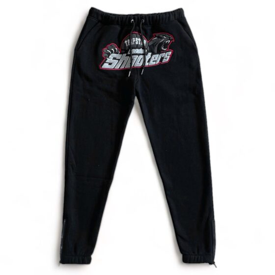 Trapstar Shooters tracksuit in black and red featuring a hoodie and matching pants set displayed on a neutral background.