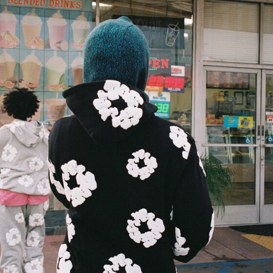 Black hoodie from Central AE featuring a unique cotton wreath design by Denim Tears.