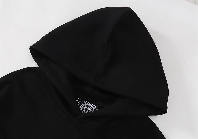 Central ae Sp5der Web Hoodie in black, featuring a spider graphic on the front and a cozy hood with drawstrings.