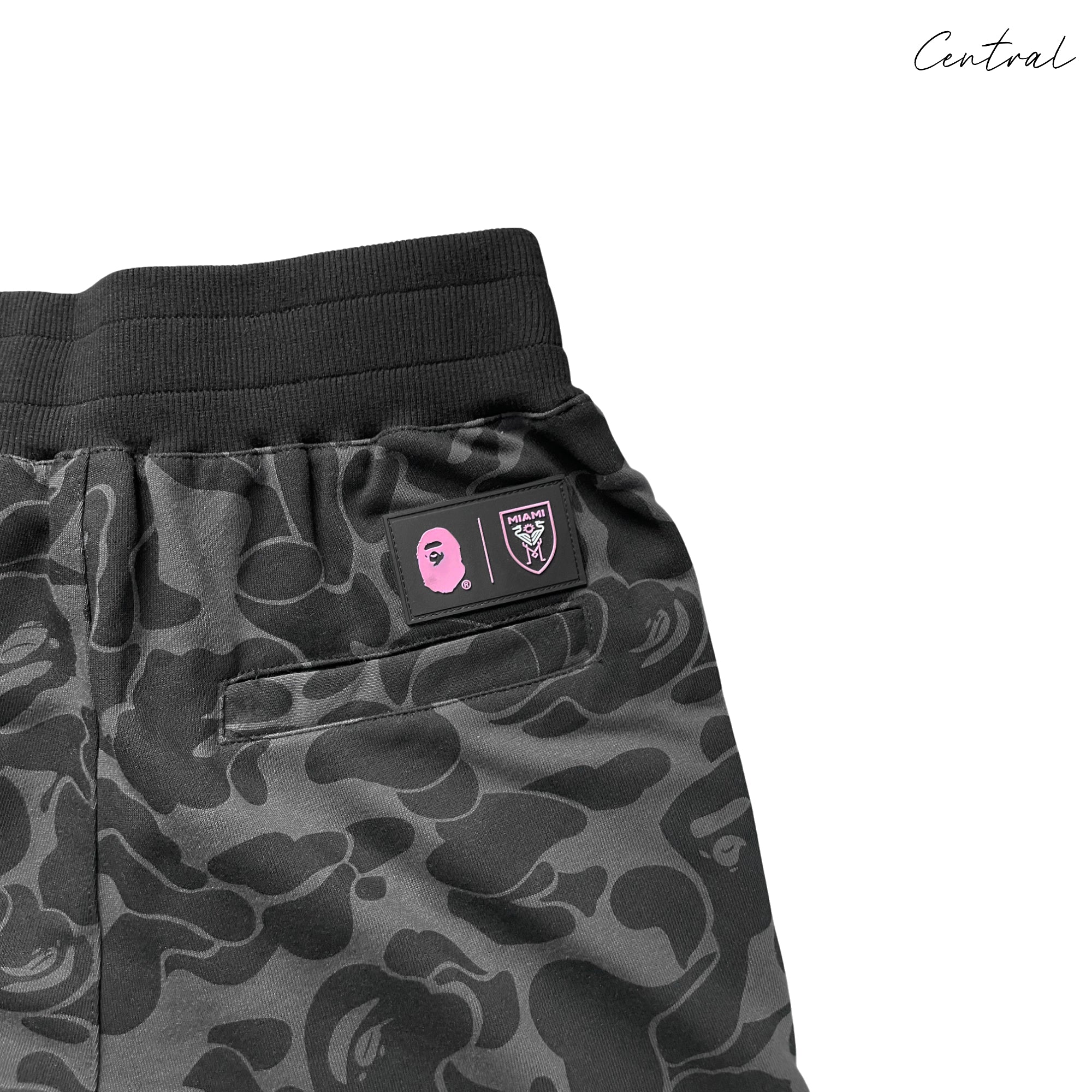 BAPE x Inter Miami camo shorts in green and beige, featuring a comfortable fit and unique camouflage pattern.