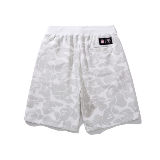 BAPE x Inter Miami camo shorts in white featuring a stylish design by Central ae, displayed on a neutral background.