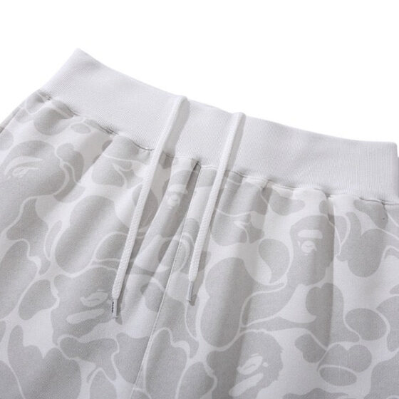 BAPE x Inter Miami camo shorts in white featuring a unique camouflage design and relaxed fit by Central ae.