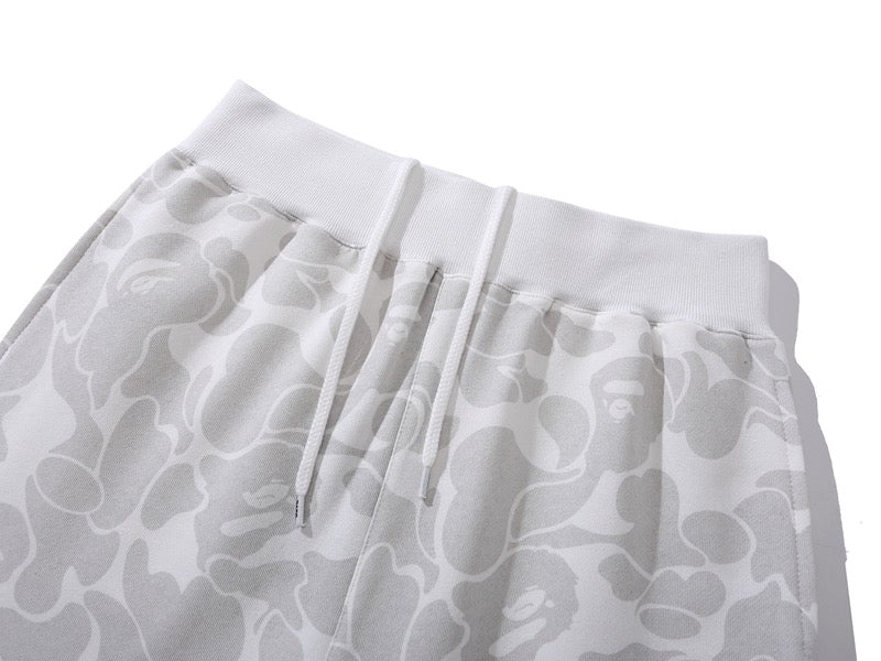 BAPE x Inter Miami camo shorts in white featuring a unique camouflage design and relaxed fit by Central ae.