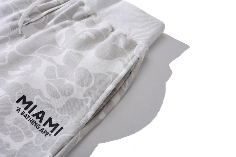 BAPE x Inter Miami camo shorts in white, featuring a stylish design and comfortable fit, photographed from the front.