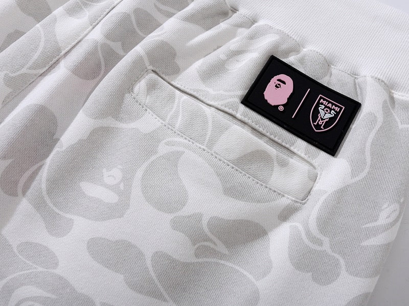 BAPE x Inter Miami camo shorts in white, featuring a unique camouflage pattern and comfortable fit.