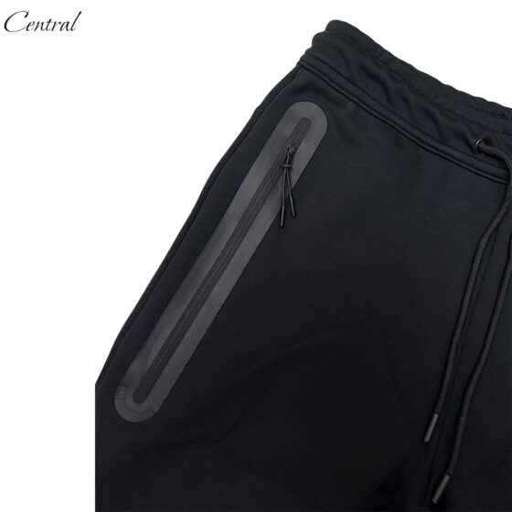 Nike Sportswear Tech Fleece in black, featuring a sleek design and modern fit for casual wear and athletic activities.