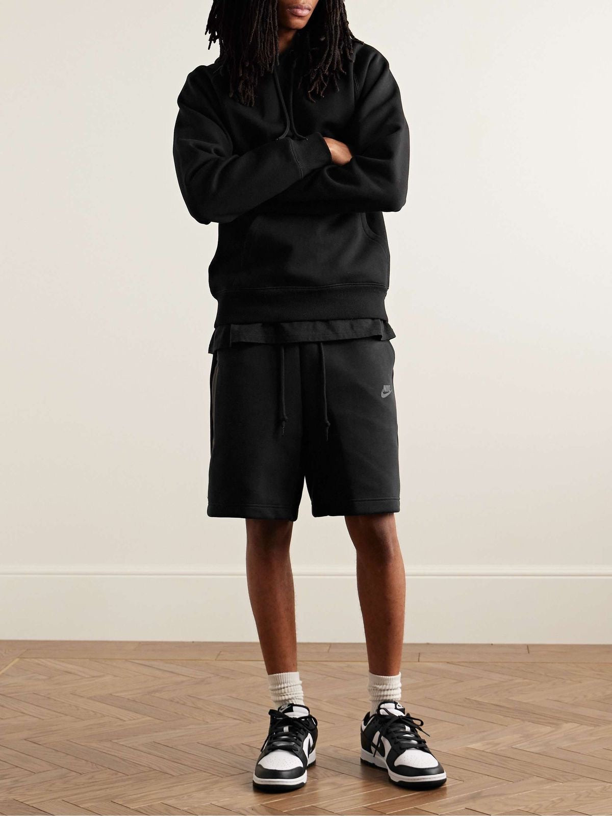 Nike Sportswear Tech Fleece in Black, featuring a sleek design and soft fabric for comfort and warmth.