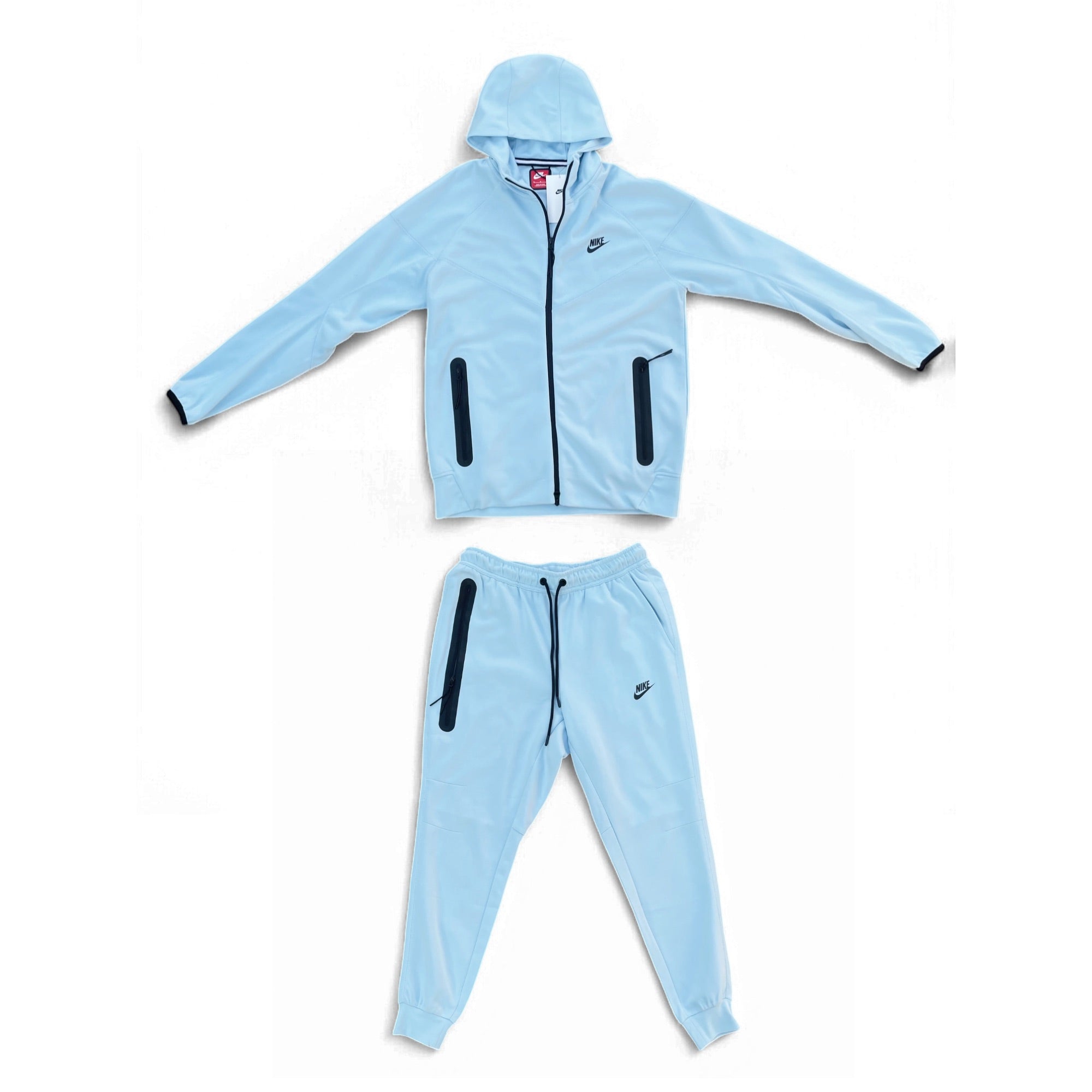 Baby blue Nike Tech Fleece tracksuit featuring a hoodie and joggers, perfect for active infants.