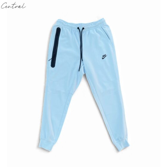 Baby blue Nike Tech Fleece tracksuit featuring a zip-up hoodie and matching pants for toddlers.