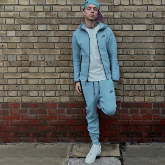 Baby blue Nike Tech Fleece tracksuit featuring a zip-up jacket and matching pants for toddlers.