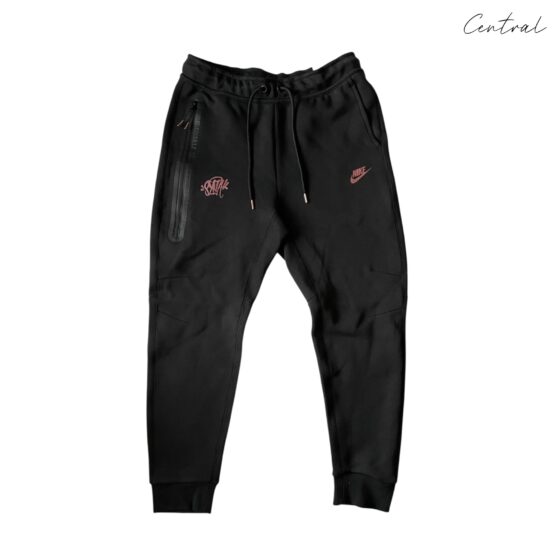 Nike x Central Cee Tech Fleece in gray with a modern design, featuring a hood and zip pockets for a stylish look.