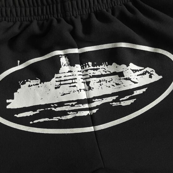 Black Corteiz Alcatraz sweatpants featuring a relaxed fit and elastic waistband, perfect for casual wear.