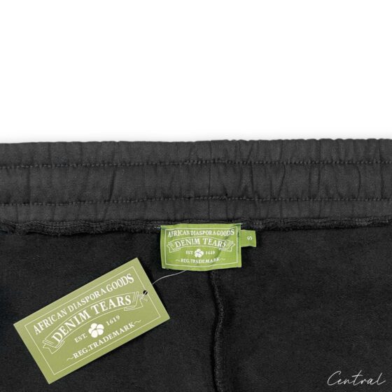 Black sweatpants from Central AE featuring a unique cotton wreath design. Perfect for casual and comfortable wear.