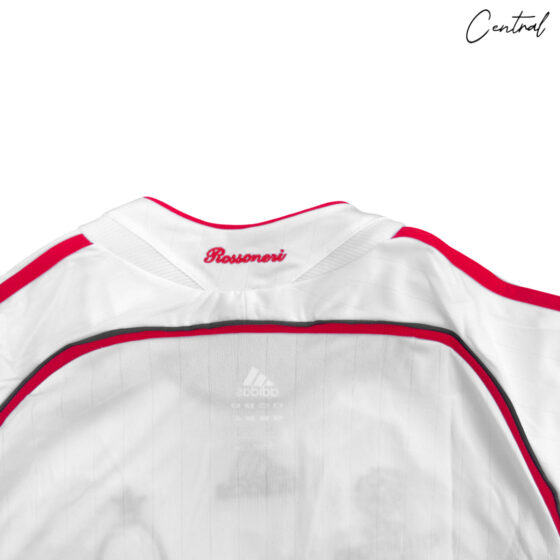 AC Milan 2006/07 UCL Final away retro jersey featuring Bwin logo and classic design in black and red.