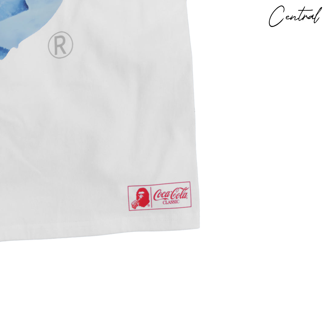 White BAPE x Coca-Cola Photo Ape Head Tee featuring a graphic ape logo on the front, designed by Central Ae.