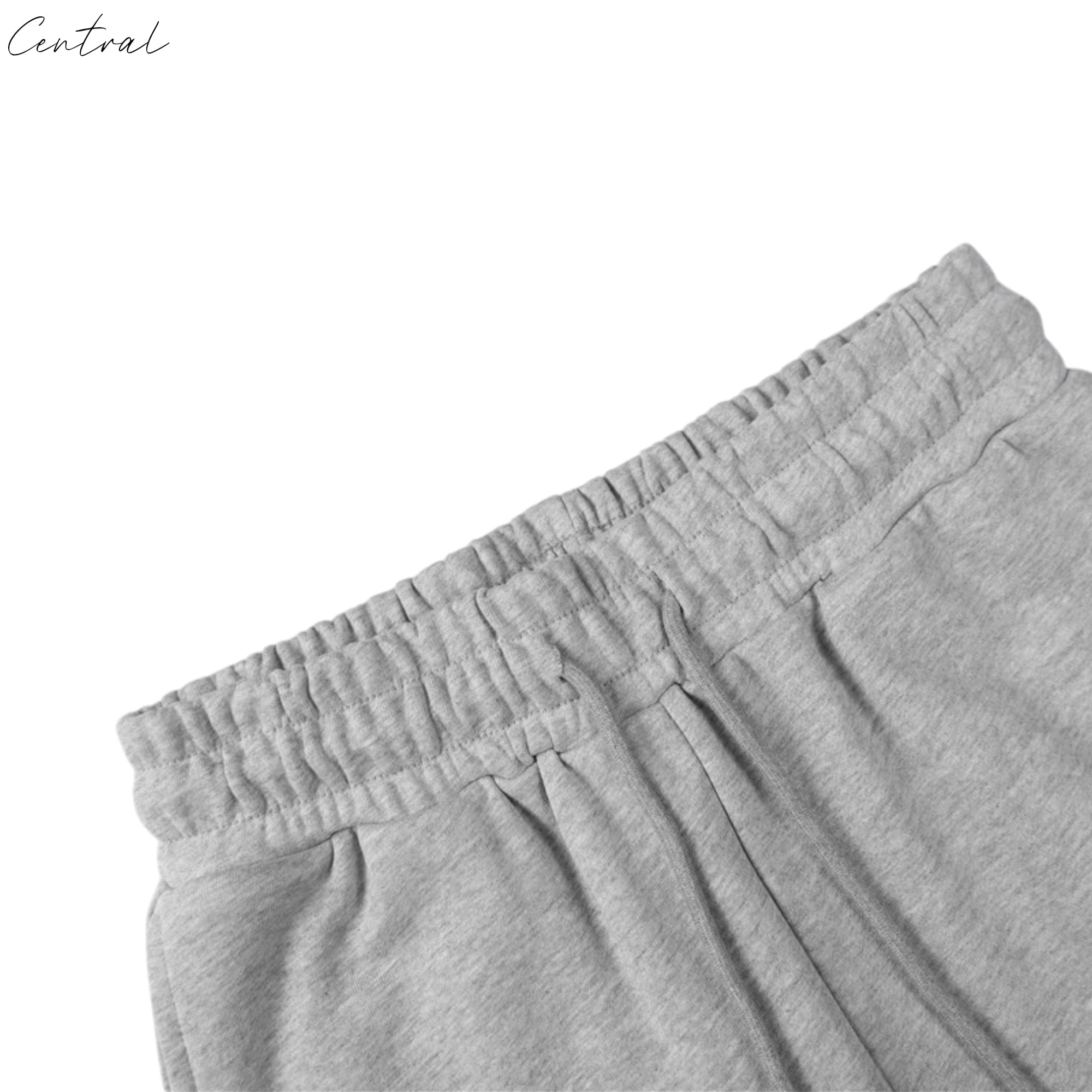 Gray sweatpants from Central ae featuring a cotton wreath design, showcasing a relaxed fit and soft fabric.