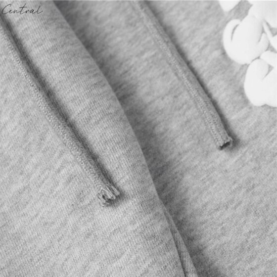 Gray sweatpants from Central ae featuring the Denim Tears Cotton Wreath design, showcasing a relaxed fit and soft fabric.