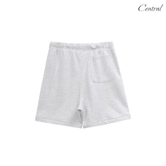 Light grey Essential Shorts by CENTRAL AE, featuring a relaxed fit and comfortable fabric for casual wear.