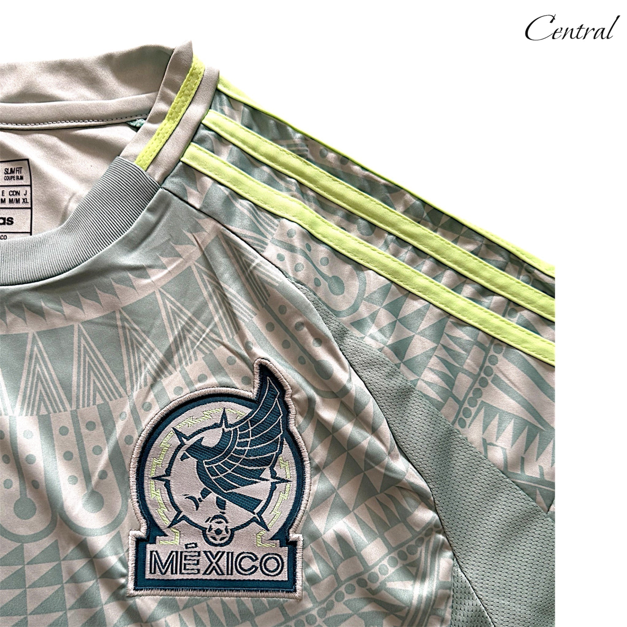 Mexico 2024/25 Away Fan version jersey featuring team colors and logo, displayed on a mannequin with a sporty backdrop.