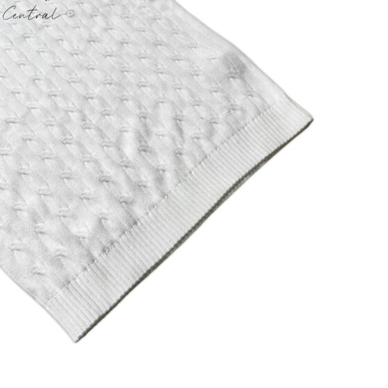 White cable-knit cotton jumper by Polo Ralph Lauren, featuring a classic design and textured knit pattern.