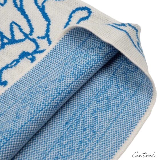 Rhude Knit Tile Shorts in Crème and Blue, showcasing a stylish knit pattern and relaxed fit for casual wear.