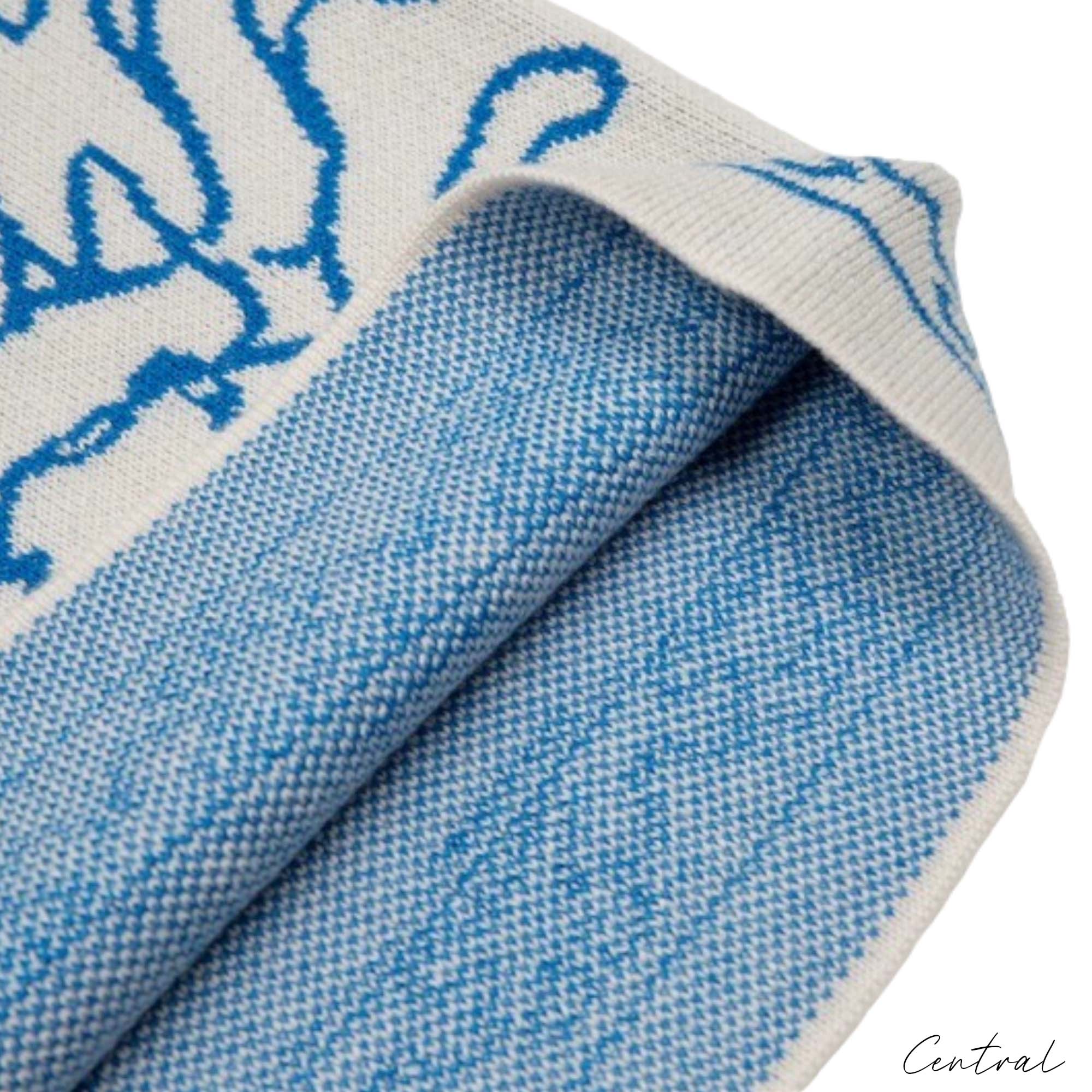 Rhude Knit Tile Shorts in Crème and Blue, showcasing a stylish knit pattern and relaxed fit for casual wear.