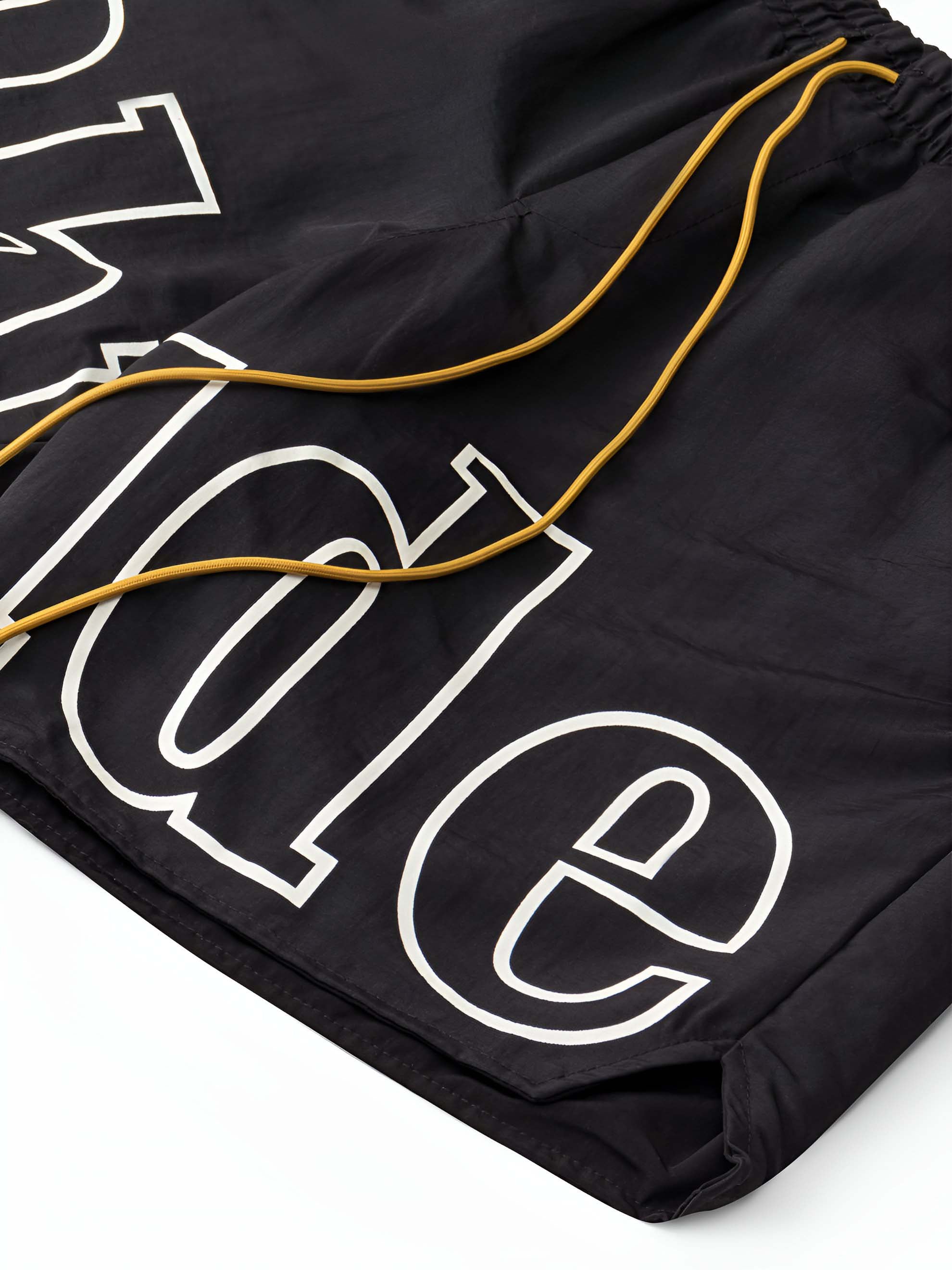 Black Rhude shorts displayed on a neutral background, featuring a relaxed fit and stylish design.