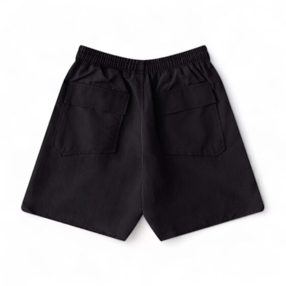 Rhude black shorts displayed on a neutral background, showcasing the relaxed fit and stylish design details.