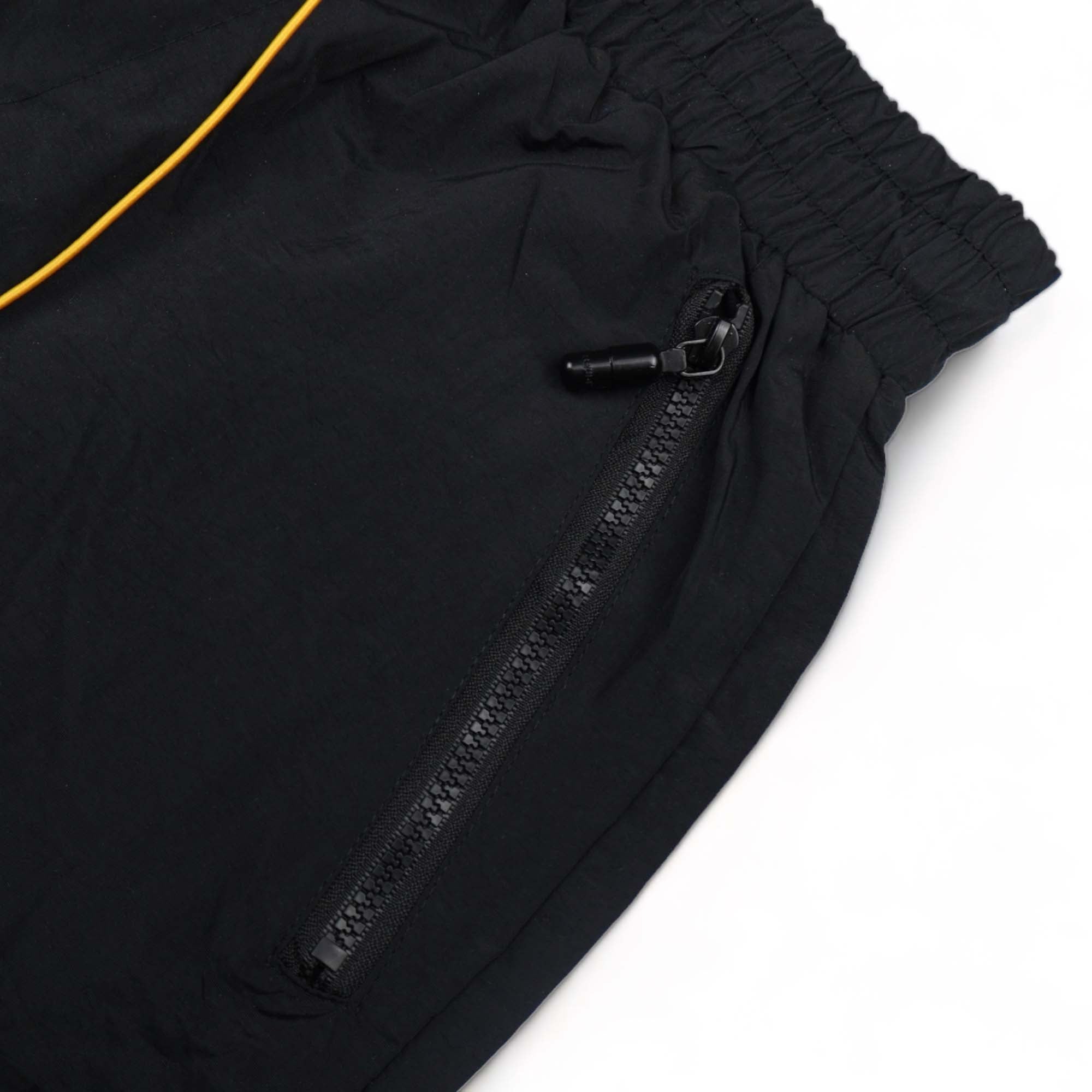 Rhude black shorts featuring a relaxed fit and stylish design, perfect for casual or streetwear outfits.