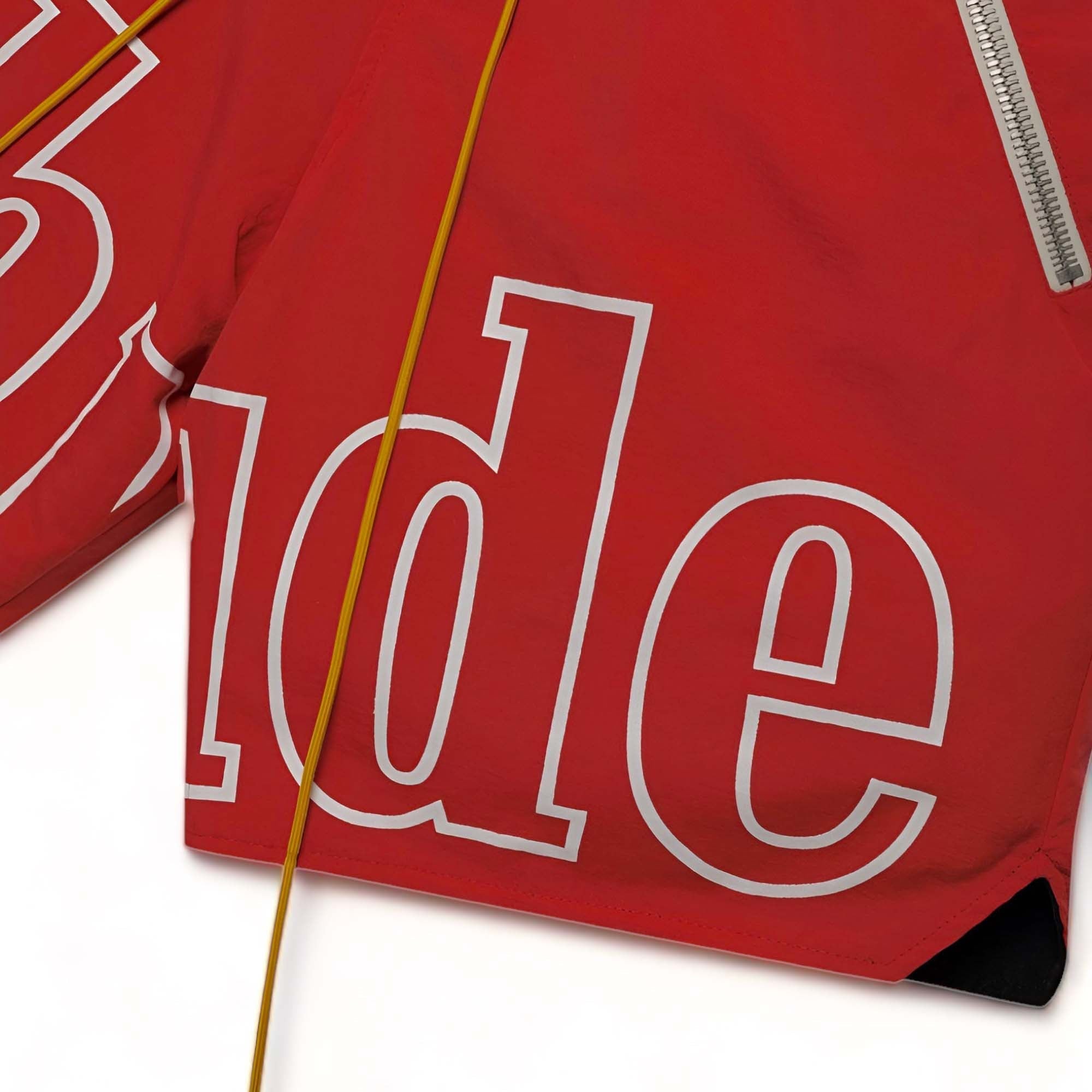 Red Rhude shorts featuring a relaxed fit and stylish design, perfect for casual summer wear.