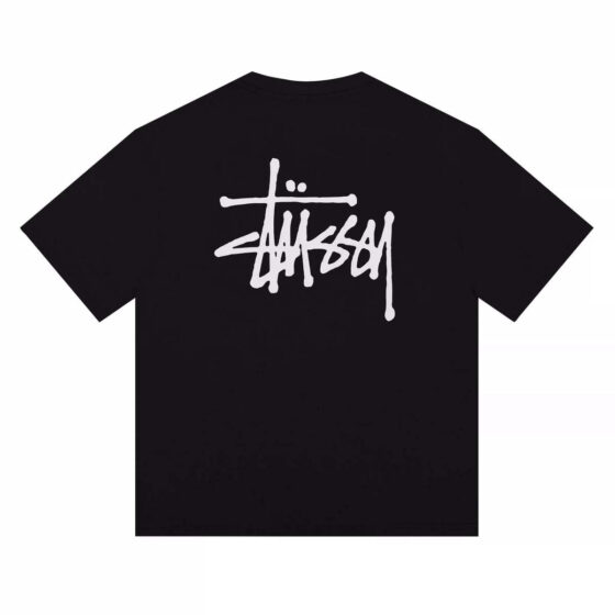 Black BASIC STÜSSY TEE t-shirt displayed on a neutral background, showcasing its simple design and logo.