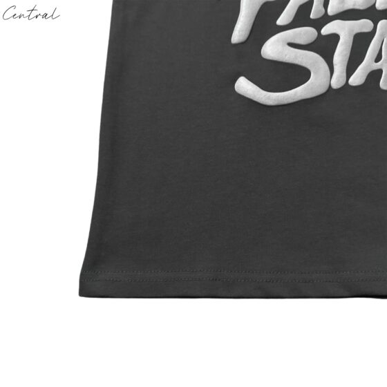 Central ae Broken Planet Falling Stars T-Shirt featuring a vibrant star graphic on a casual short-sleeve tee.