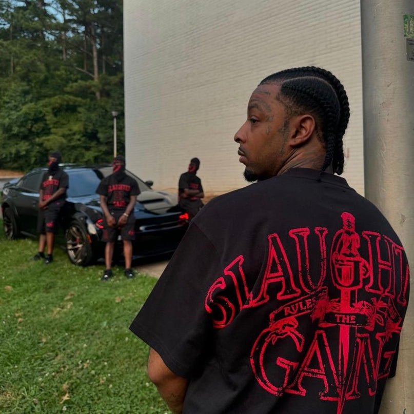 Corteiz x Slaughter Gang 21 Savage T-shirt featuring bold graphic design on a black cotton fabric.