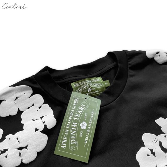 Central ae Denim Tears t-shirt featuring a bold graphic design on a classic fit in a casual setting.