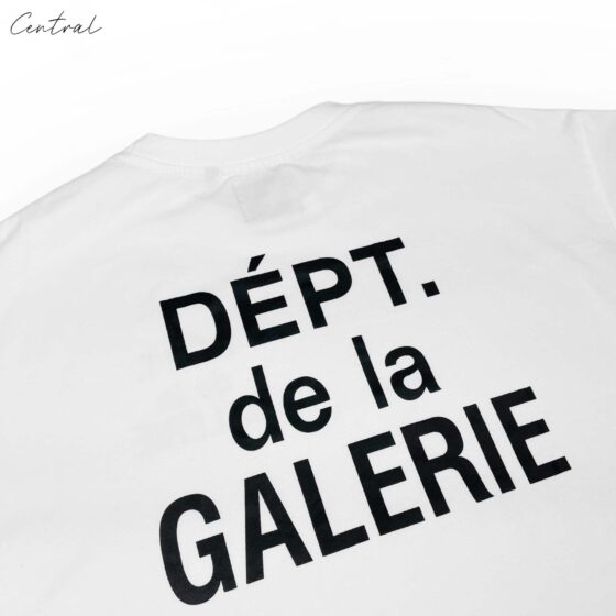 Back view of a Gallery Dept. T-shirt featuring the central ae logo prominently displayed.