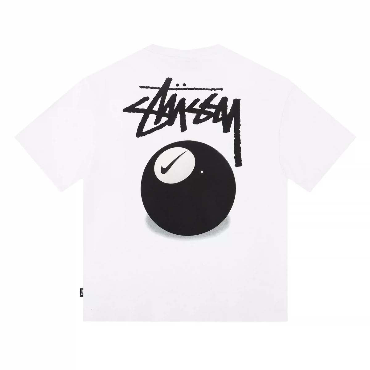 White NIKE X STUSSY 8 BALL T-SHIRT featuring a graphic design and relaxed fit, displayed on a neutral background.