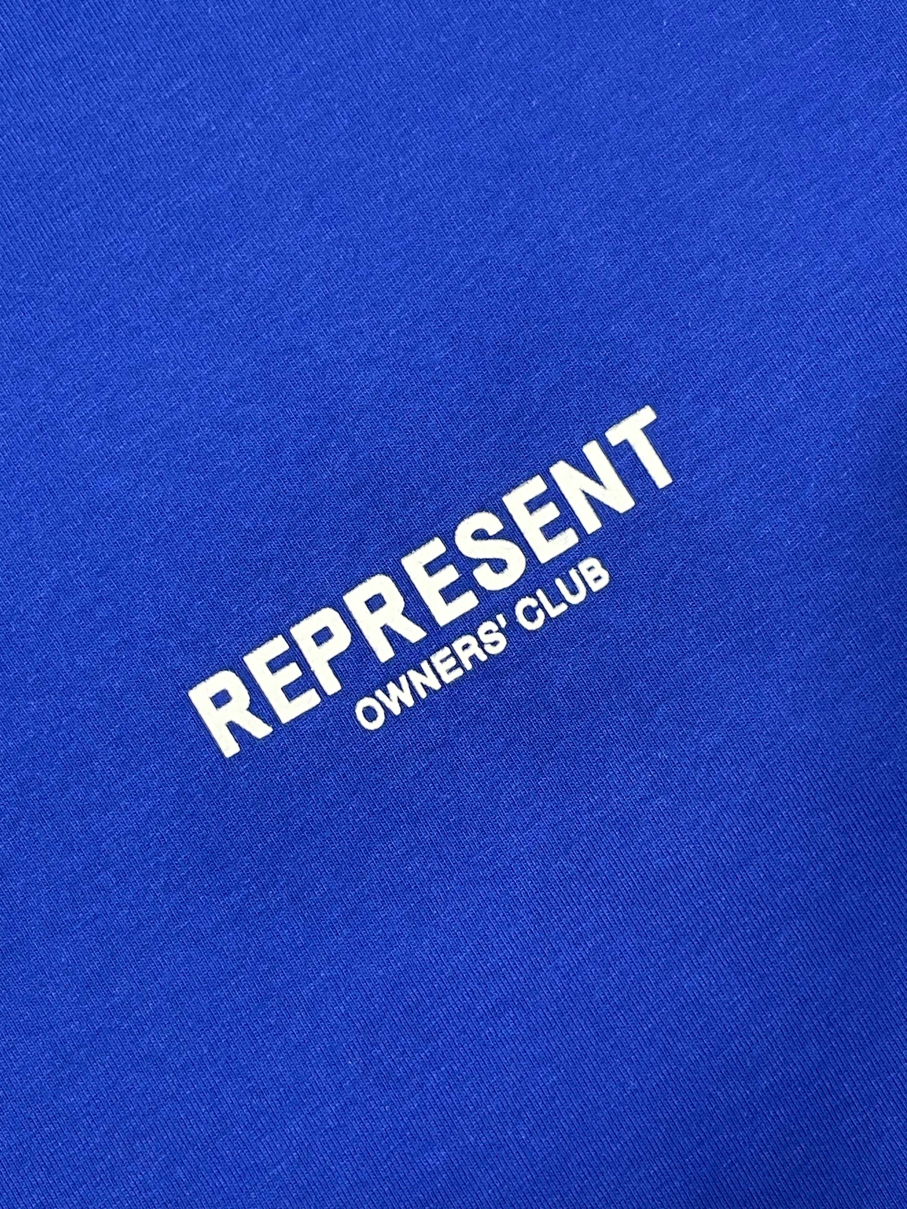 Cobalt blue REPRESENT OWNERS CLUB T-shirt featuring a classic crew neckline and short sleeves.