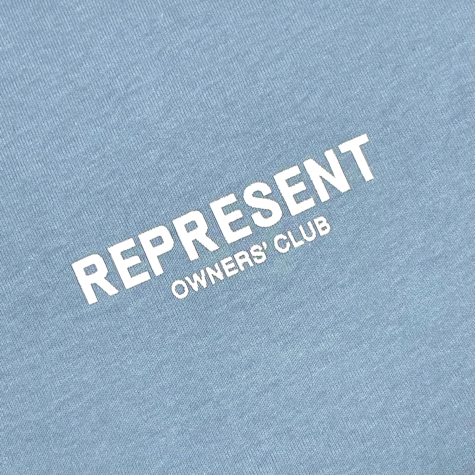 Powder blue REPRESENT OWNERS CLUB T-shirt featuring a relaxed fit and logo design by central.ae.