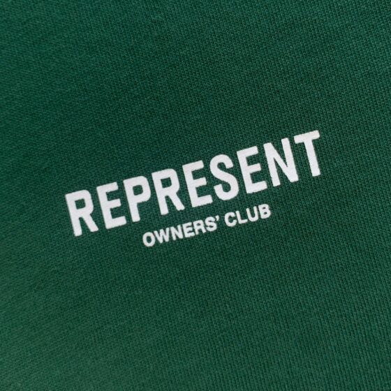 Racing Green REPRESENT OWNERS CLUB T-shirt featuring a classic fit and logo on soft cotton fabric.