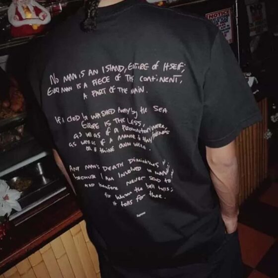 Central AE Sup Corteiz Rules The World Tee in black, featuring bold graphic text on a casual t-shirt design.