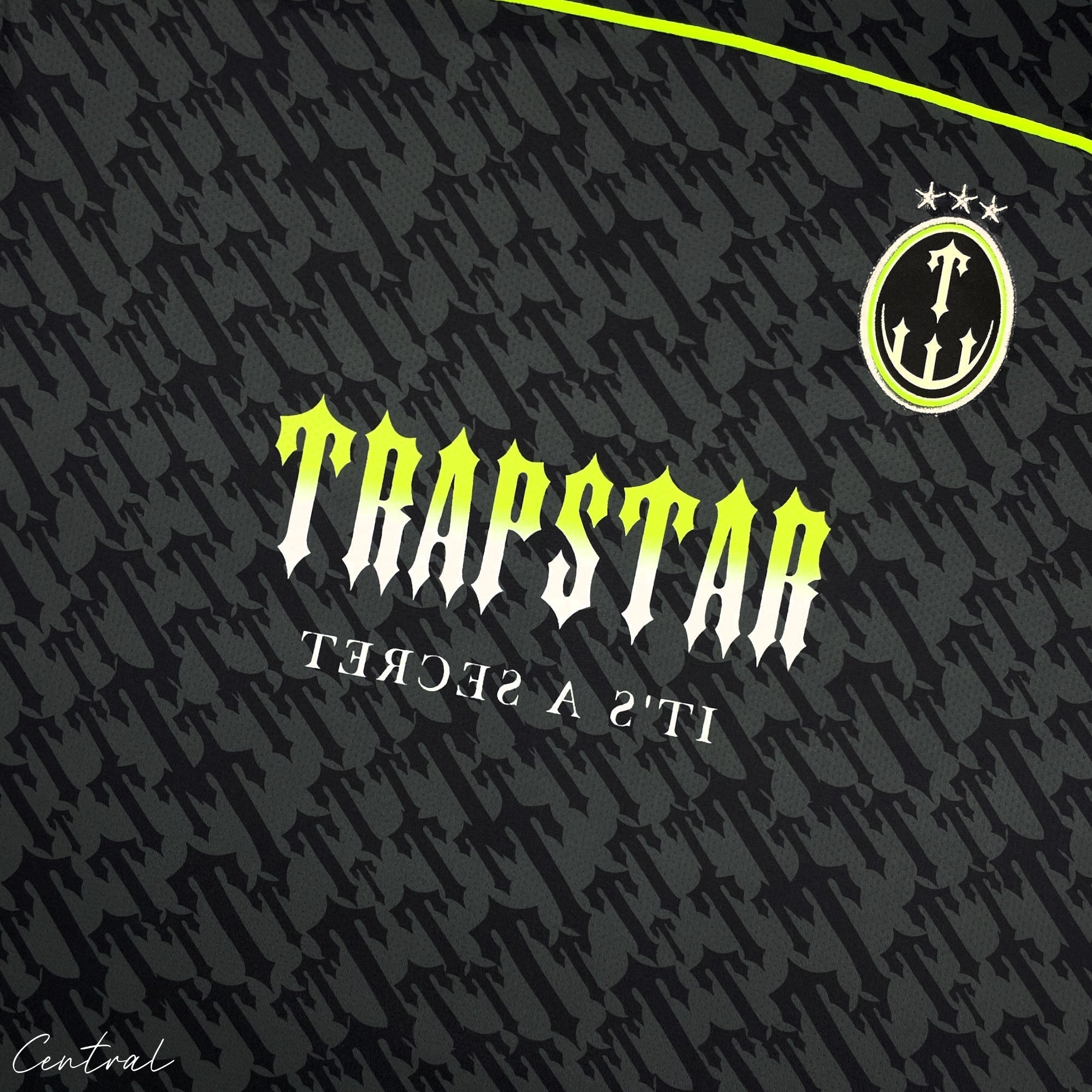Trapstar Monogram Jersey T-shirt in black and lime with bold logo design on the front.