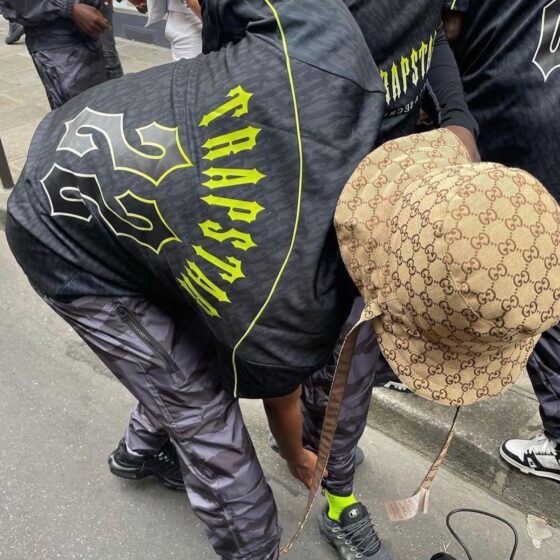 Trapstar Monogram Jersey T-shirt in black and lime green, featuring a stylish logo design on soft fabric.