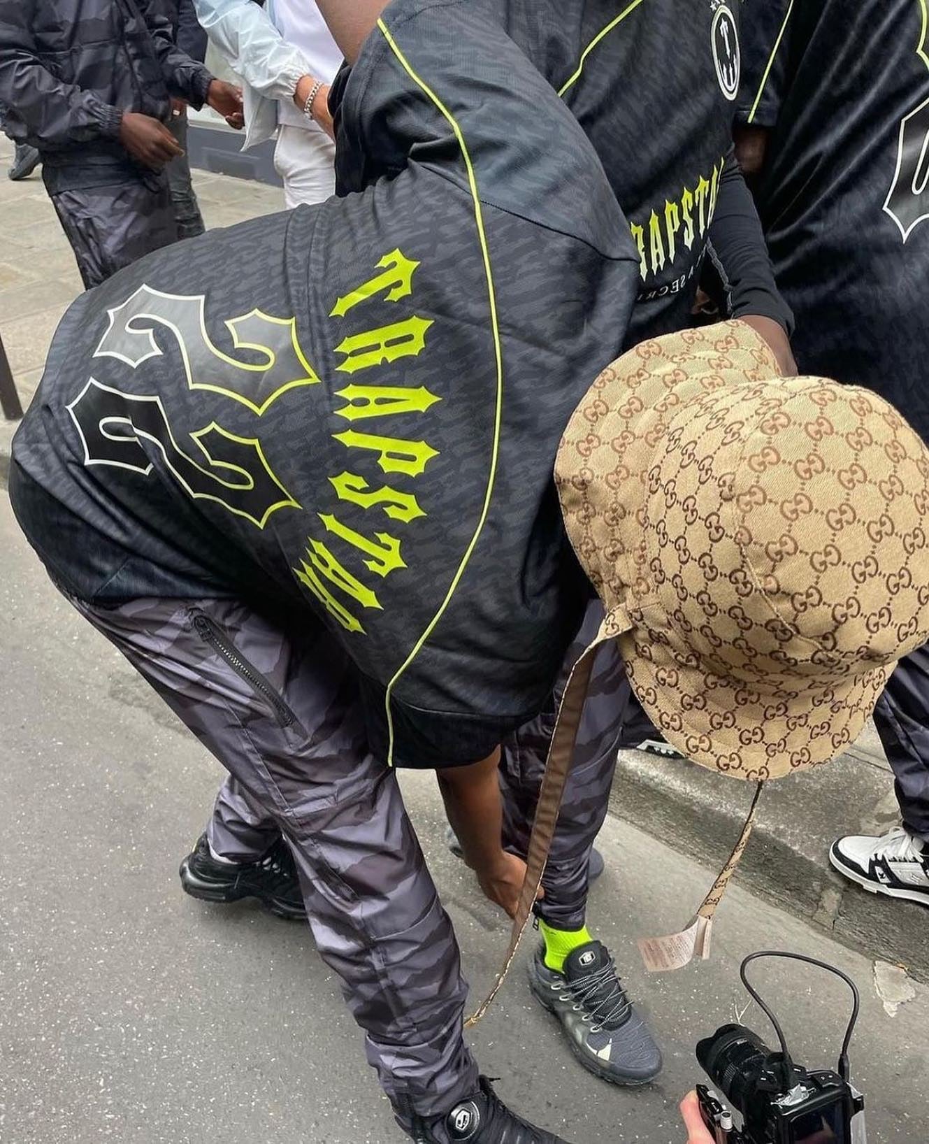 Trapstar Monogram Jersey T-shirt in black and lime green, featuring a stylish logo design on soft fabric.